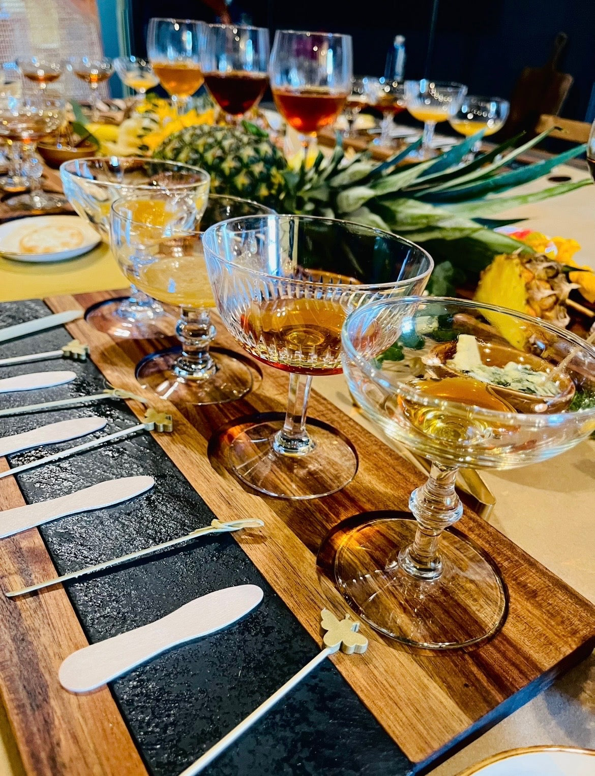 Formal honey-tasting session featuring crystal goblets with honey samples for Los Angeles guest experience.